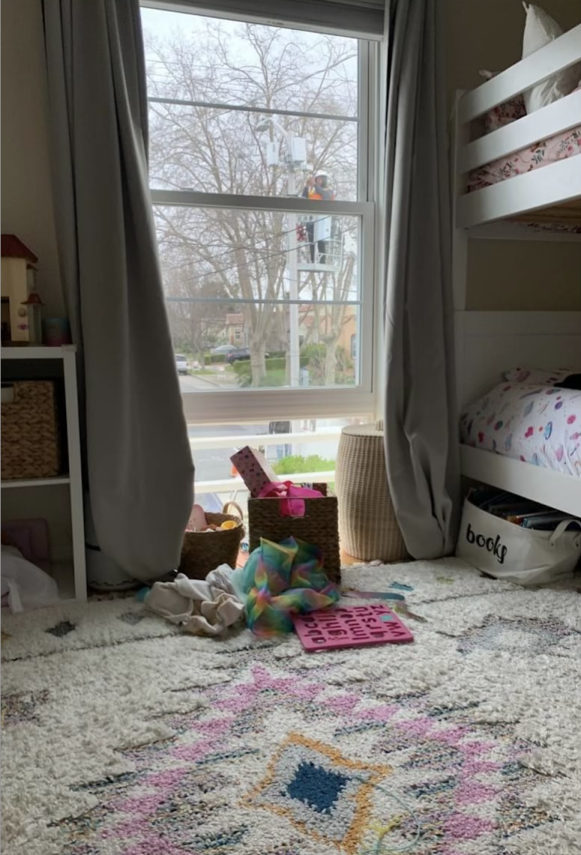 A small cell infrastructure is being installed outside a young child's bedroom.